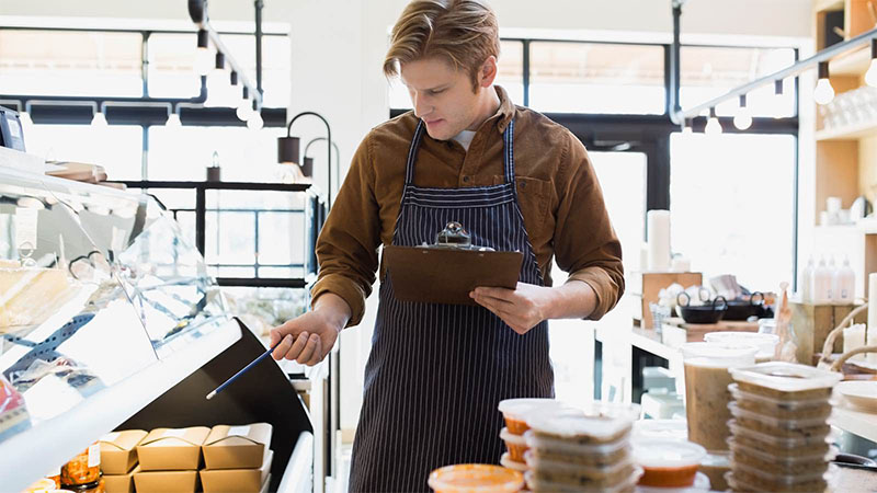 man in food shop