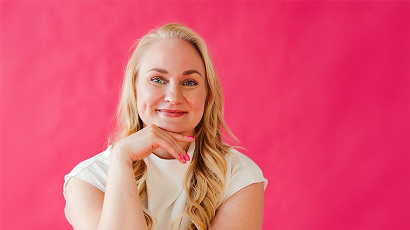 Tytti Tamminen posing with pink background